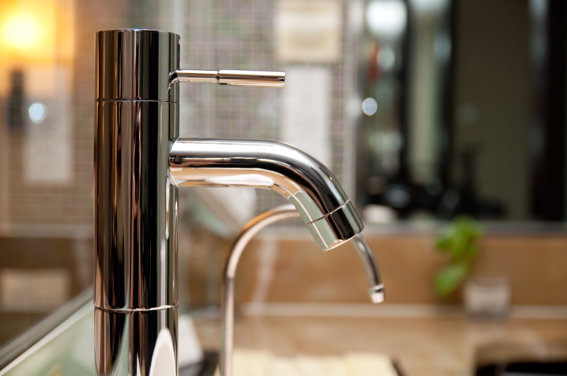 Leaking tap being repaired in South Kensington